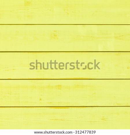 Vintage yellow wood plank as texture and background
