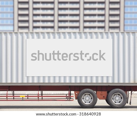 Blank billboard frame on cargo container track