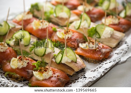 Appetizers on a tablet served by a caterer in a restaurant or hotel