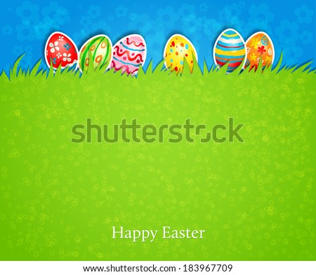 Holiday easter background. The colored eggs on the green grass