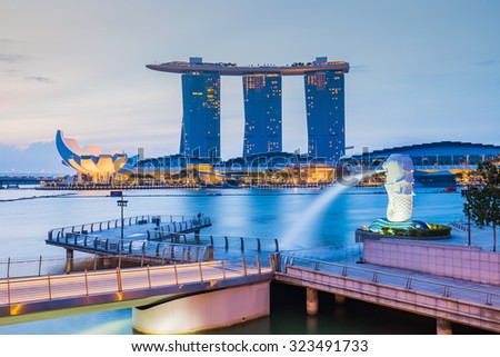Singapore City, Singapore - July 18, 2015: Marina Bay skyline and Merlion in the morning. The Marina Bay is a bay near Central Area in of Singapore, and lies to the east of the Downtown Core.