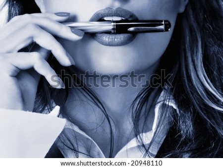 Sexy businesswoman teacher student woman girl holding a pen in her mouth lipstick lipgloss makeup