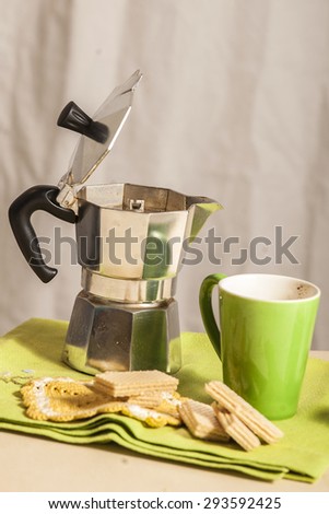 Breakfast with Italian coffee and wafers one white background.