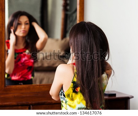 beautiful woman with the mirror