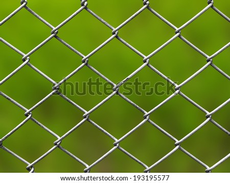 Metal fences, metal fences with the details of the background is green space.with clipping path