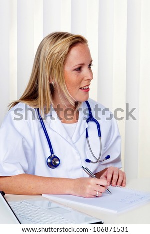 a young doctor in the doctor\'s office. with stethoscope
