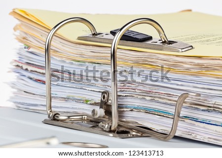 a file folder with documents and documents. storage contracts.