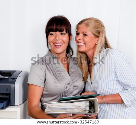 Two women in conversation at the office