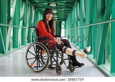 Young woman with leg in plaster
