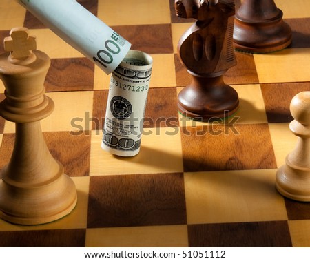 Chess with the dollar and euro bank note. Icon for depreciation of the dollar against euro.