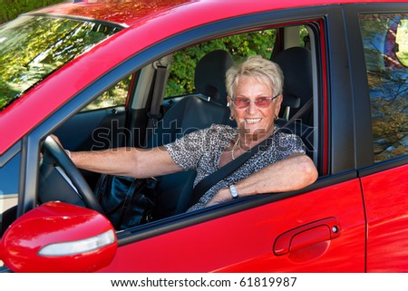 Older Woman when wearing a seat belt in a car.