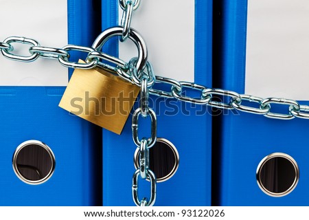 a file folder with chain and padlock closed. privacy and data security.