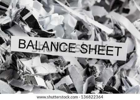 shredded paper tagged with balance sheet, symbol photo for data destruction, budgets and accounting