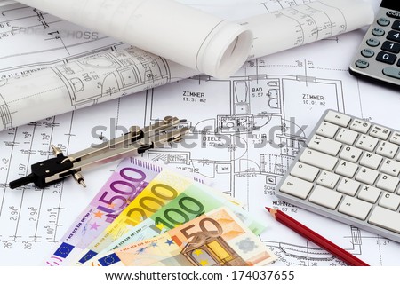 an architect\'s blueprint with euro money. symbolic photo for funding and planning of a new house.
