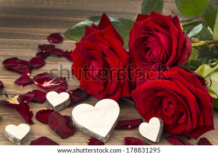 roses as a gift and surprise to a party. symbolic photo for birthday, mother's day, love, valentine's day