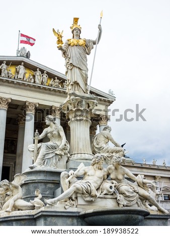 the parliament in vienna, austria. with the statue of \