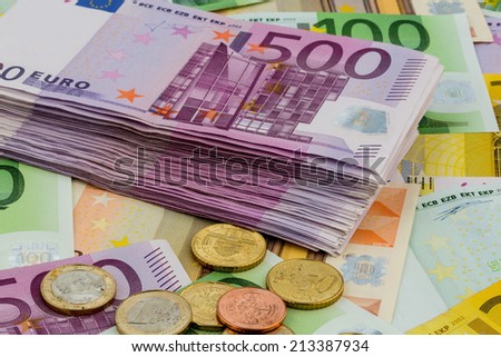 many different euro bills. symbol photo for wealth and investment.