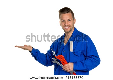 a worker in a trade or business (craftsmen) with tool in hand