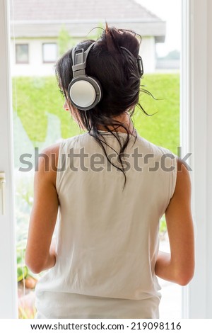 woman listening music with headphones. relax and unwind
