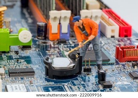 computer board and workers, symbol photo for computer failure, maintenance, data security