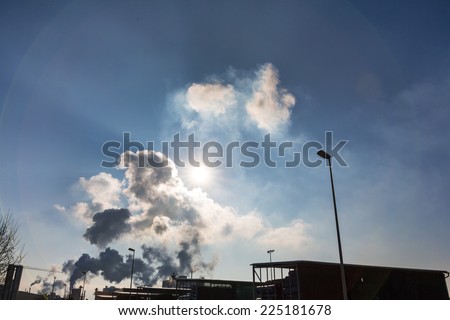 vent an industrial plant with smoke. symbol photo for environmental protection and ozone.
