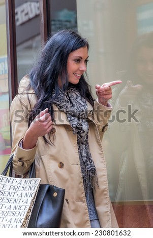 a young woman einkausbummel. shopping in the city is fun