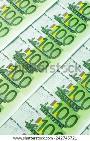 many einhhundert euro banknotes are adjacent. photo icon for wealth and investment
