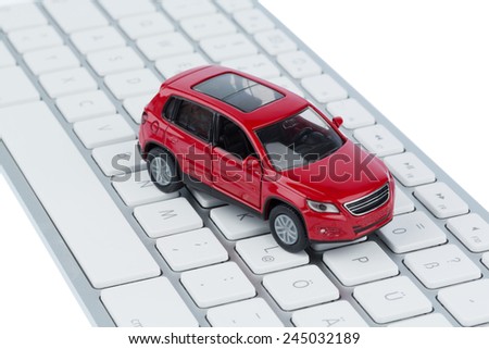 car on keyboard symbol photo for car buying and car trade on the internet