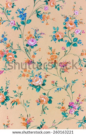 an old retro wallpaper with a floral pattern.