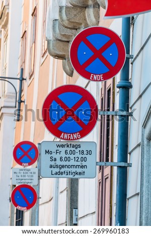 signs stopping downtown, symbol of prohibition, parking space, delivery vehicles
