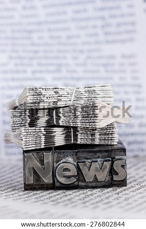 the word news written with lead letters. symbolic photo for newsletters, newspapers and information