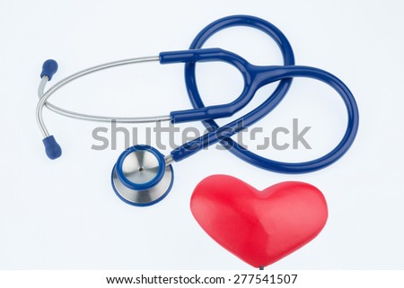 stethoscope and a heart symbol photo for cardiovascular risk and heart attack
