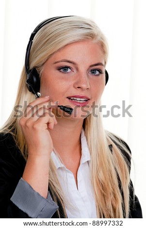 young woman with telephone headset in a call center Stock foto © 