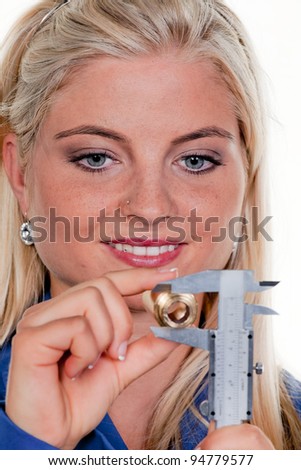 young woman as a plumber in blue work clothes. Stock foto © 