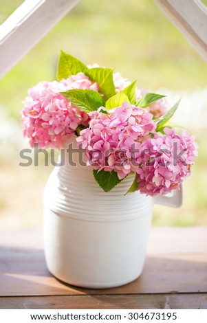 Hydrangea bouquet in white jug