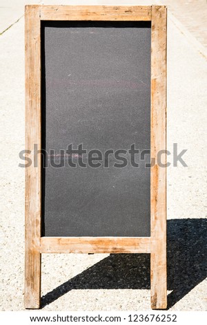 empty black board (menu board) at a restaurant - nice backgroud with space for text