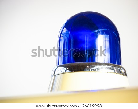 blue light at an old police car
