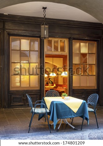 table for two at a restaurant in italy