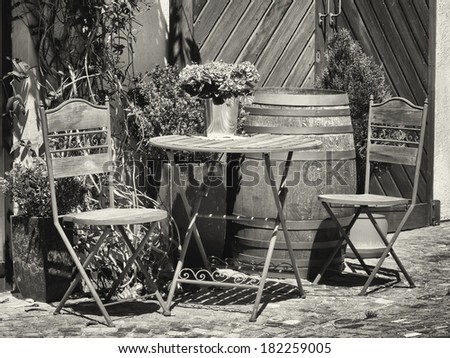 folding chair and table at a patio