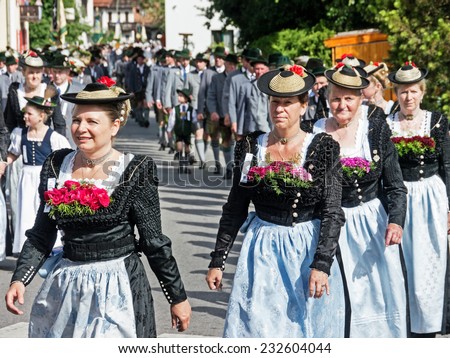 BAD TOELZ, GERMANY - JULY 1 - Women at the Corpus Christi procession at July 1, 2012 in Bad Toelz - Germany.