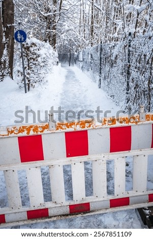 Similar – Image, Stock Photo red-white barrier beacons in front of a richly decorated but slowly decaying residential house with yellow-brown clinker facade from the Gründerzeit / dilapidated / lost place