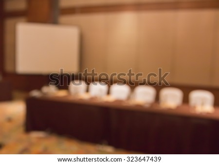 Blur row of white seat in hotel conference room  for background