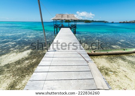 Wooden jetty in the remote Togean Islands, Central Sulawesi, Indonesia.