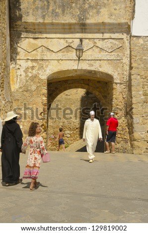 ASILAH, MOROCCO - AUGUST 28: Gate into the Medina on August 28, 2012 in Asilah, Morocco. Asilah is a fortified town on the northwest tip of the Atlantic coast of Morocco.