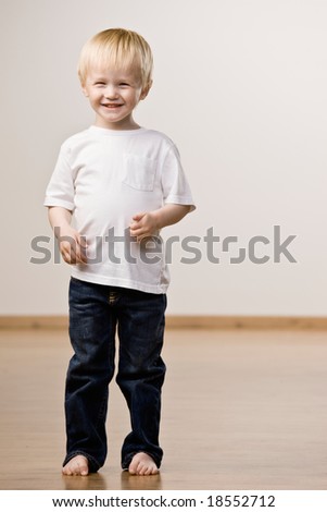 Happy, confident boy laughing