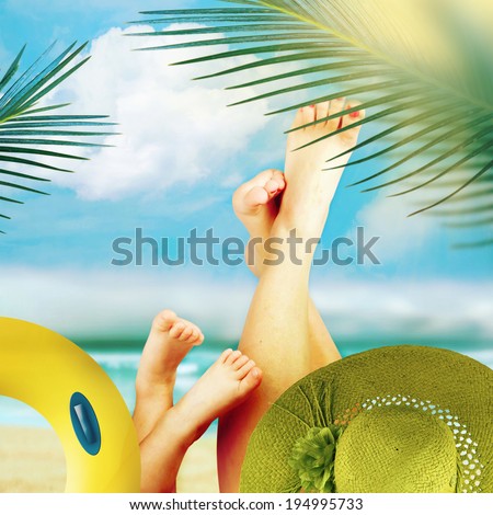 Feet of child and mom on the sky background. Vacation background.