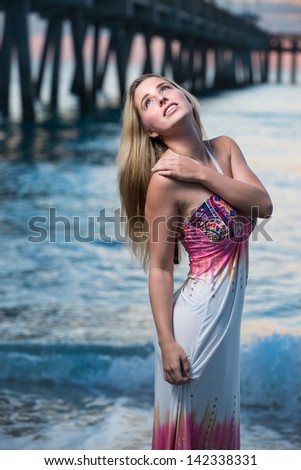 Blonde hair model in a print dress