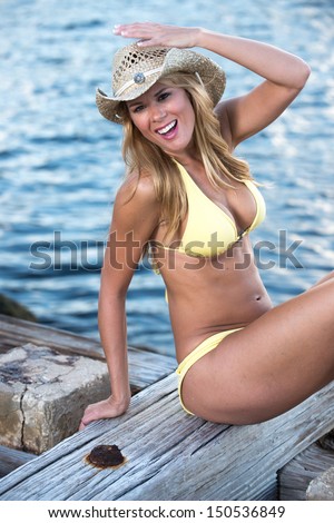 Yellow Swimsuit  Beach themed shoot with blonde haired model.