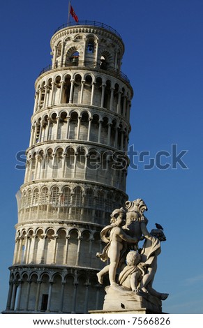 Leaning tower of Pisa with statue in foreground