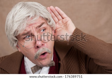 Old Man With Hard Of Hearing